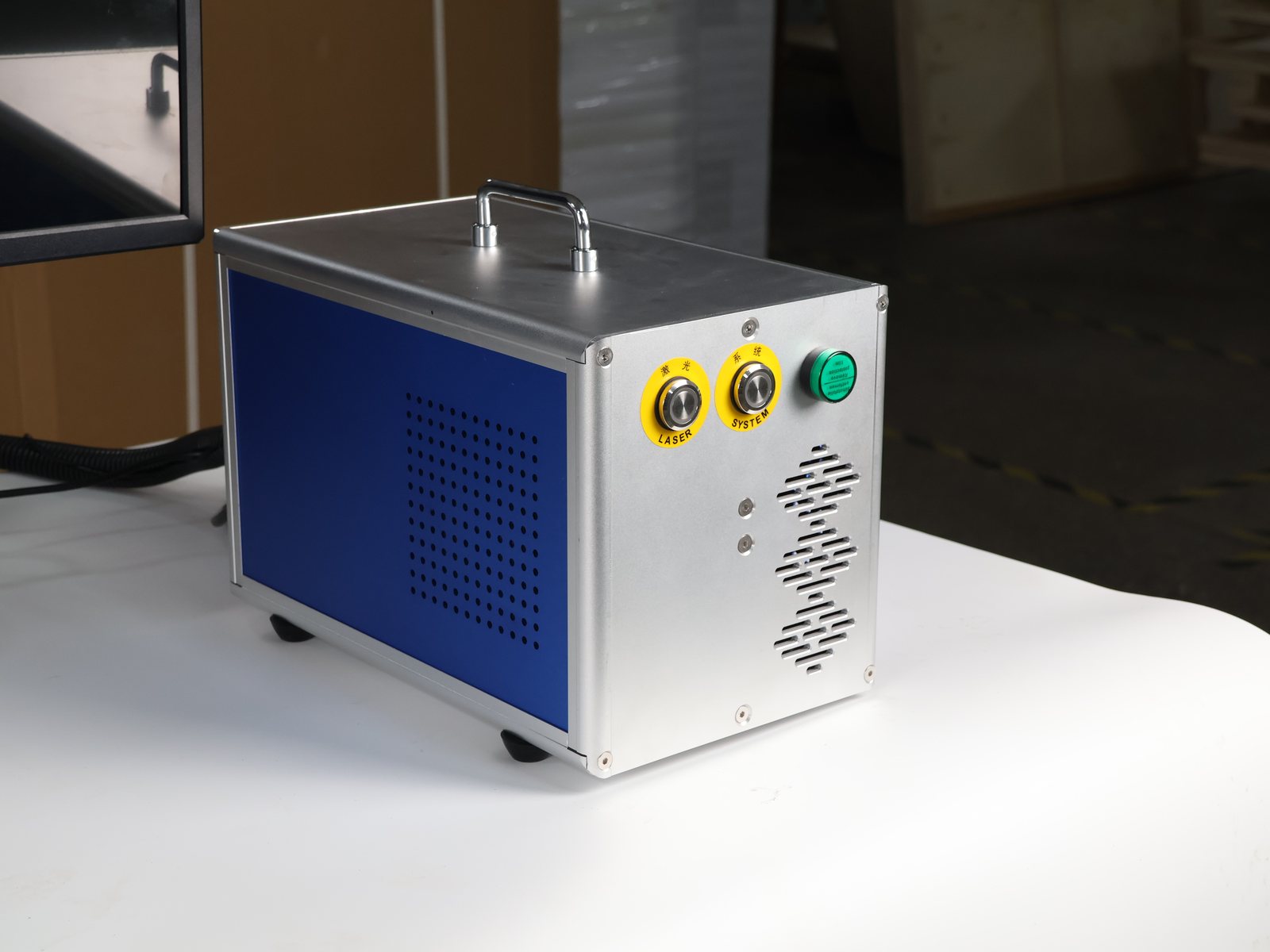 Benchtop laser marking machine with an enclosed work area